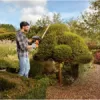 Black+Decker Elektro-Heckenschere (600W, 60 cm Schwertlänge, 25 mm Schnittstärke, Bügel-Zweithandgriff und transparentem Handschutz, für große Hecken) BEHTS501 - Image 7